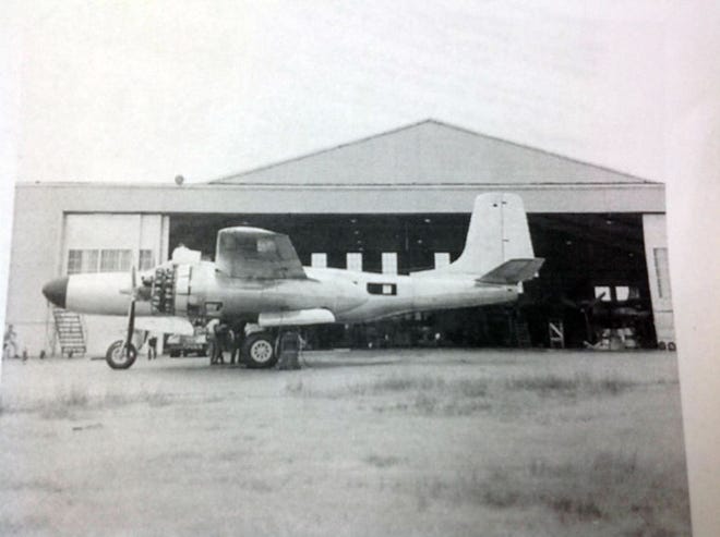 A surplus military A-26 plane sits at the Hutchinson Municipal Airport while being converted for personal use in the 1960s.