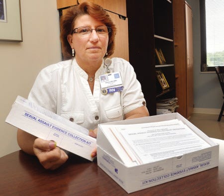 Doreen Gilligan has been a trained Sexual Assault Nurse Examiner at Portsmouth Regional Hospital since 2004. She is shown with the evidence collection kits that SANE nurses use in the emergency department.