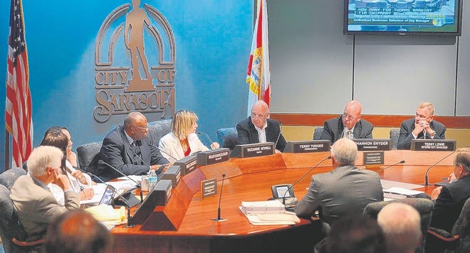 The Sarasota City Commission is shown meeting in July 2012. Frustration with 
the commission's frequent failure to cooperate on meeting the city's 
challenges has sparked a string of efforts to institute an elected mayor and 
related City Charter reforms.
HERALD-TRIBUNE ARCHIVE / 2012