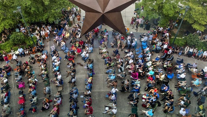 More than 1,200 people fill the courtyard for the opening night of Music Under the Star at the Bullock Texas State History Museum.