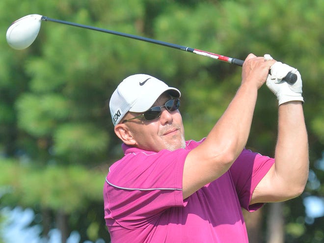 Glenn Gann tees off druing the first round of the Coca-Cola Spartanburg County Senior Men’s Amateur Tournament at Woodfin Ridge Golf Club on Monday.