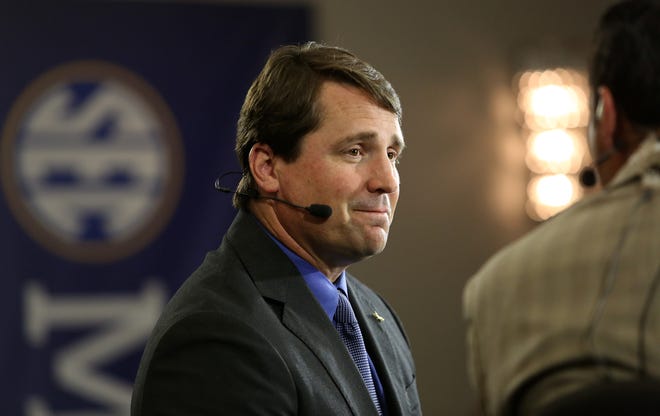 Florida head coach Will Muschamp does an interview with ESPN's Joe Tessitore during day one of the 2014 SEC Media Days at the Hyatt Regency Wynfrey Hotel in Hoover, Ala., Monday, July 14, 2014.