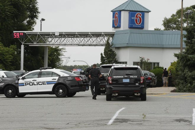 Warwick police respond to reports of a man with gun inside the Motel 6 on Jefferson Boulevard.