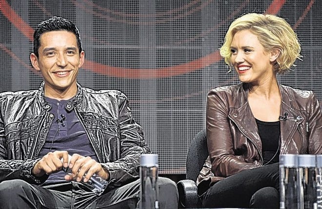 IMAGE DISTRIBUTED FOR EL REY NETWORK - Actors Gabriel Luna, left, and Nicky Whelan appear on the "Matador" panel at the El Rey Network 2014 Summer TCA on Thursday, July 10 2014, in Beverly Hills, Calif. (Photo by John Shearer/Invision for El Rey Network/AP Images)
