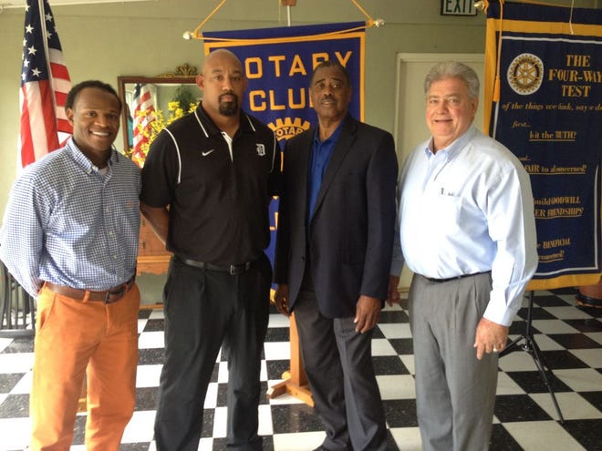 Donaldsonville High coaches Jimmy Joseph and Benny Guilbeaux stands with State Representative Ed Price and Rotarian Marvin Gros at Café Lafourche last week.