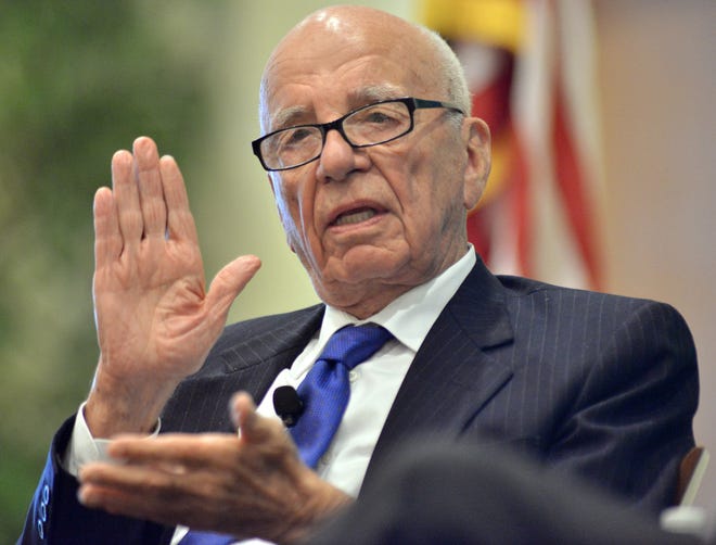 In this Aug. 14, 2012 file photo, News Corporation CEO Rupert Murdoch speaks during a forum on The Economics and Politics of Immigration in Boston.