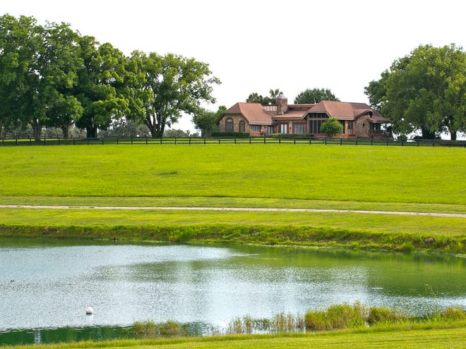The main residence of Winding Oaks Farm in Ocala sits atop a hill along Southwest 66th Street in this file photo from June 12, 2014.