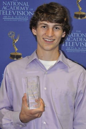 Connor Smith accepts a National Association of Television Award.