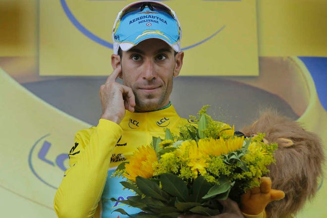 Tour de France leader Vincenzo Nibali of Italy celebrates on the podium Thursday after the 12th stage finished in Saint-Etienne, France. Nibali said the sport of cycling has changed and few competitors take part in illegal doping.