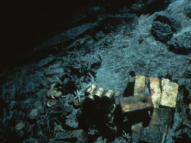 This 1989 file photo shows gold bars and coins from the SS Central America, a mail steamship, which sunk in a hurricane in 1857, about 200 miles off the South Carolina coast.