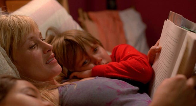 This image released by IFC Films shows Patricia Arquette and Ellar Coltrane in a scene from the film,"Boyhood." (AP Photo/IFC Films)