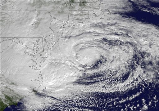 This NOAA satellite image taken Monday, Oct. 29, 2012 shows Hurricane Sandy off the Mid Atlantic coastline moving toward the north with maximum sustained winds of 90 mph. (AP Photo/NOAA)