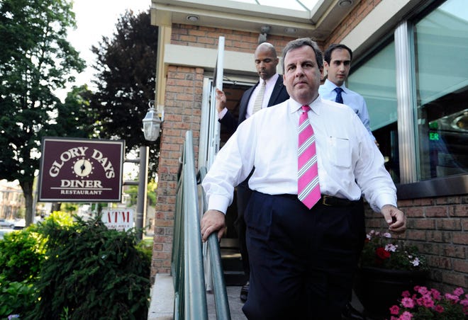 New Jersey Gov. Chris Christie leaves a diner, Monday, July 21, 2014 in Greenwich, Conn. Christie at the diner with Connecticut Republican gubernatorial candidate Tom Foley.