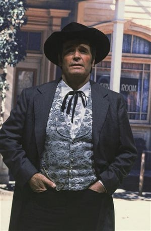 FILE - Actor James Garner is shown in character as "Bret Maverick" on the set of his television show, in this April 13, 1982 file photo taken in Los Angeles, Calif. Actor James Garner, wisecracking star of TV's "Maverick" who went on to a long career on both small and big screen, died Saturday July 19, 2014 according to Los angeles police. He was 86. (AP Photo/Wally Fong, File)