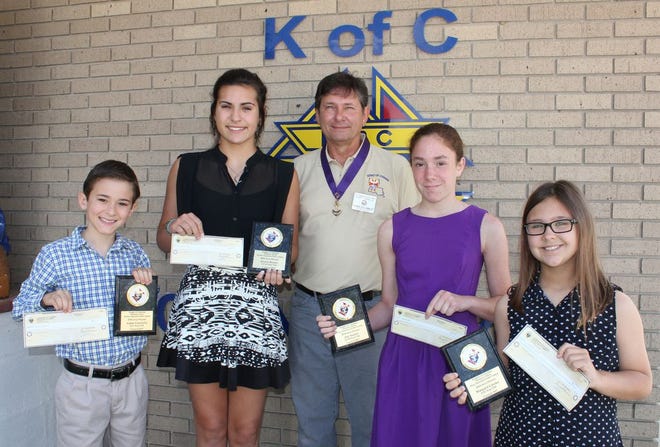 Shown are, from left, Knight of Columbus Substance Abuse Art Poster Contest state level winners: Adam Cockfield, Brylee Brown, Knights of Columbus Council #2657 Grand Knight Charles Amiot, Zoe Soulier, and Margaret Giesler.