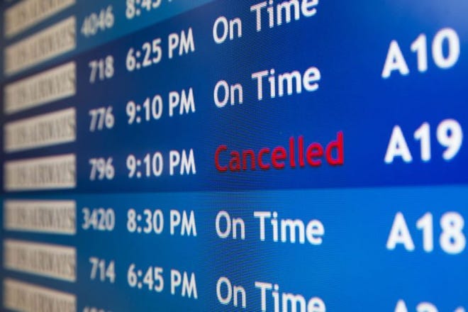 A departure board at the Philadelphia International Airport shows that US Airways Flight 796 to Tel Aviv has been canceled, Tuesday, July 22, 2014, in Philadelphia. The Federal Aviation Administration is telling U.S. airlines they are prohibited from flying to the Tel Aviv airport in Israel for 24 hours after a Hamas rocket exploded nearby. (AP Photo/Matt Rourke)