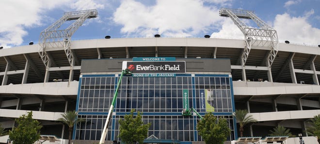 EverBank Field signage is being placed on and around the stadium Wednesday, September 08, 2010, in Jacksonville, FL. The current east and west side signage is temporary. The permanent backlit signage should be in place by the Monday night game against the Tennessee Titans on October 18. The team plans to announce a 10-year-extension Friday.
