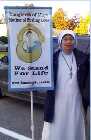 Sister Mary Rose Reddy, who regularly prays and holds a “We Stand For Life” sign outside a Greenland clinic, has joined six other anti-abortion activists in suing the state seeking to block enforcement of buffer zones at abortion clinics.