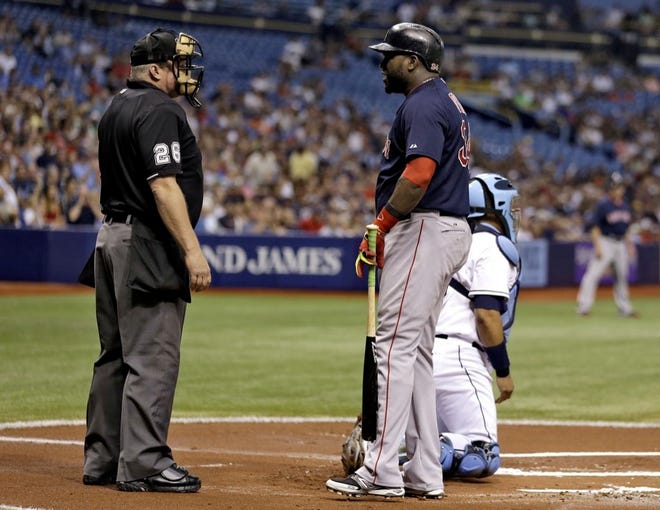 Boston's David Ortiz argues with home-plate umpire Bill Miller on Friday after getting struck out by Tampa Bay pitcher David Price during the first inning of the Rays' 6-4 victory in St. Petersburg.
(AP Photo/Chris O'Meara)