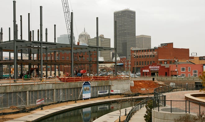 Construction on the Centennial building, a mix of condominiums and retail, is shown in this 2007 photo. Photo by CHRIS LANDSBERGER