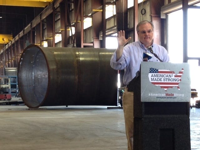 JOHN LYON • ARKANSAS NEWS BUREAU U.S. Sen. Mark Pryor, D-Ark., speaks at the Custom Metals plant in Little Rock on Friday, July, 25, 2014, during a news conference on legislation seeking to create jobs in the U.S. and discourage outsourcing. Behind Pryor is a section of duct work under construction.