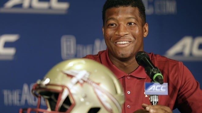 Florida State quarterback Jameis Winston talks to the media Sunday during the ACC’s kickoff event. Last season, he threw for 4,057 yards and 40 touchdowns as the Seminoles ended the Southeastern Conference’s seven-year run of BCS titles. (Chuck Burton/AP Photo)