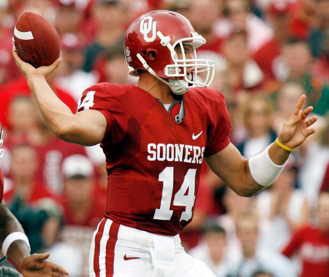 OU's Sam Bradford (14) passes in the first half during the University of Oklahoma Sooners (OU) college football game against the University of Miami Hurricanes (UM) at the Gaylord Family -- Oklahoma Memorial Stadium, in Norman, Okla., Saturday, Sept. 8, 2007. By NATE BILLINGS, The Oklahoman ORG XMIT: KOD