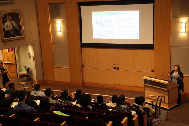 RTN education and financial literacy coordinator Kerri McLaughlin presents a “Basics of Money Management” workshop to 40 students at Brigham and Women’s Hospital on July 17. COURTESY PHOTO