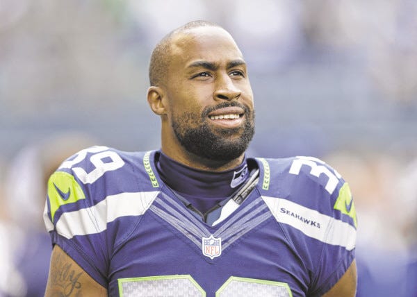 FILE - In this Sept. 22, 2013, file photo, Seattle Seahawks' Brandon Browner stands before an NFL football game against the Jacksonville Jaguars in Seattle. Former Seahawks cornerback Browner has signed with the New England Patriots.
