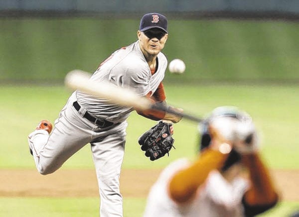 Jake Peavy delivers a pitch to Houston Astros' Jose Altuve earlier this season. Peavy was traded to the Giants on Saturday.