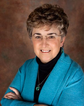 Author Susan Van Kirk was an educator for 44 years in Monmouth.