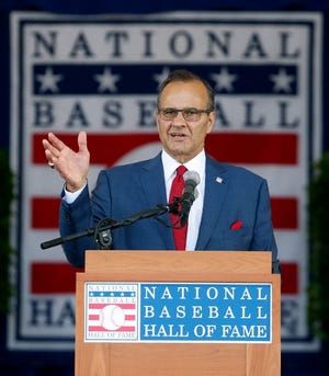 National Baseball Hall of Fame inductee Joe Torre speaks during an induction ceremony at the Clark Sports Center on Sunday, July 27, 2014, in Cooperstown, N.Y.