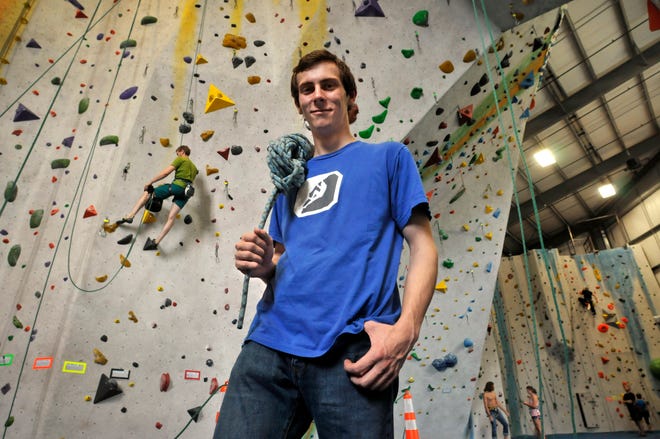 Seventeen-year-old Scott Loughlin is a rock climbing instructor at Central Rock Gym in Worcester.