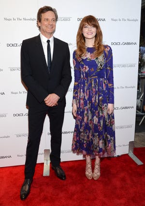 Colin Firth and Emma Stone arrive at the premiere of "Magic In The Moonlight" July 16 in New York.