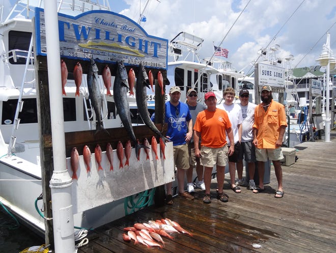 Louisiana and Tennessee anglers on the Twilight with Capt. Robert Hill brought in a good catch of king mackerel and mingo.