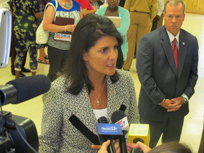 South Carolina Gov. Nikki Haley listens to a question while meeting with reporters Tuesday in Atlantic Beach. The governor had just urged town council to work with her to end the Atlantic Beach Bikefest following violence in the Myrtle Beach area last Memorial Day.