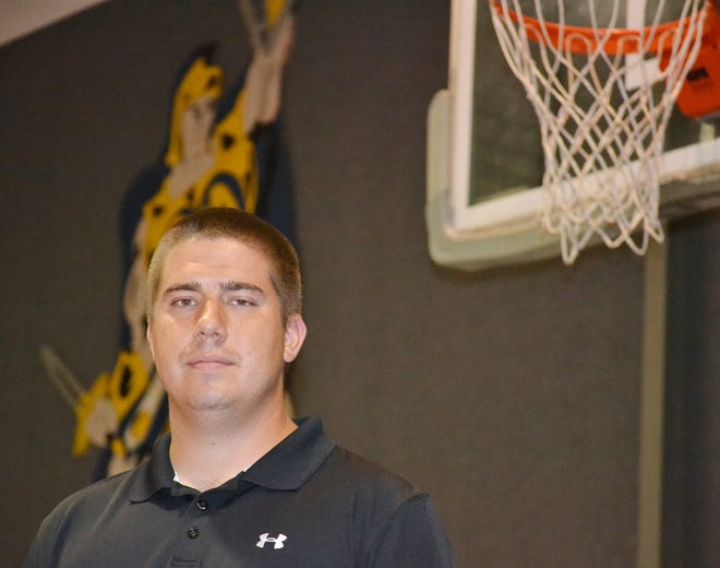 Arendell Parrott Academy former football star Brick Crowder now coaches basketball at Bethel Christian Academy.