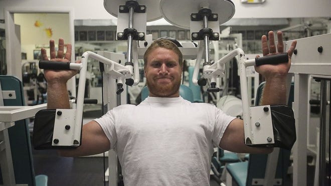 Former Dwyer and current Florida State standout Nick O’Leary puts in a high-intensity workout at Peak Performance Gym in Palm Beach Gardens on Monday. O’Leary hopes to be a first-round NFL pick. (Damon Higgins / The Palm Beach Post)