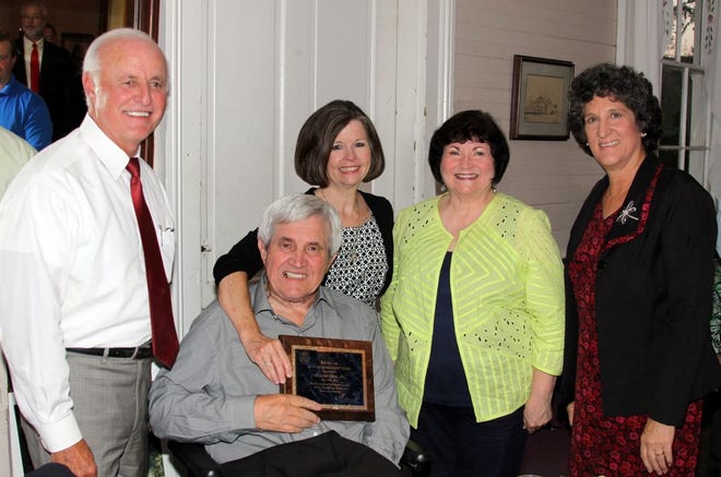 Chester J. Diez, Jr. (seated) and with his wife, Penny, receives the 1st Ascension Republican Lifetime Achievement Award from Ascension Assessor, M. J. "Mert" Smiley, Jr.(left), Joyce LaCour representing Ascension Republican Women and Kathryn Goppelt (r), Ascension Republican Parish Executive Committee Chairman.T he event took place on July 10th at the Schoolhouse of The Cabin Restaurant.
