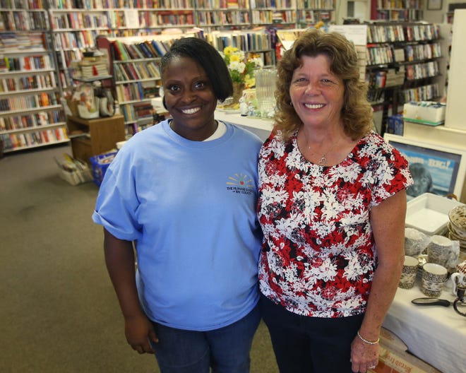 Sunshine Willis, left, stands with Sheila Davis at the Humane Society of Bay County Thrift & Gift Shop on Wednesday.