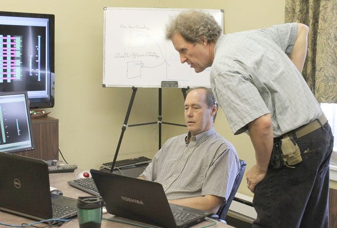 Gregg Rawson (standing) and Ben Cooper have been swapping tech ideas together for over 10 years.