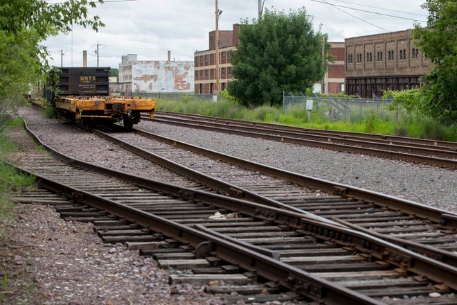 Legat Architects of Chicago has been hired to begin designing a train station for Amtrak service to Chicago near railroad tracks south of Cedar Street, an area pictured Tuesday, July 15, 2014, in Rockford.