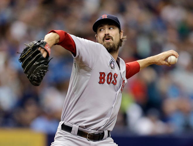 The Baltimore Orioles fortified their bullpen Thursday, obtaining former Buchholz lefty Andrew Miller from the Boston Red Sox for minor league pitcher Eduardo Rodriguez. (The Associated Press)