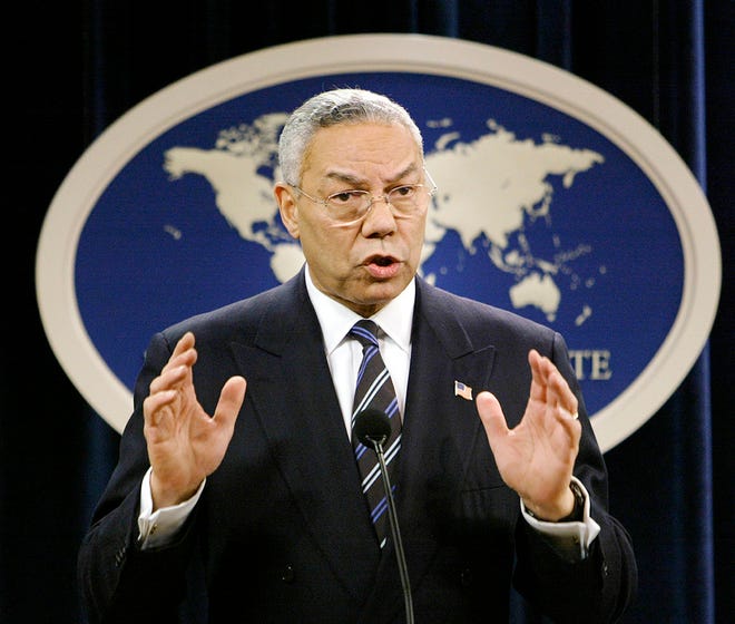 In this Jan. 8, 2004, file photo, then-Secretary of State Colin Powell speaks at a news conference in Washington at the State Department.