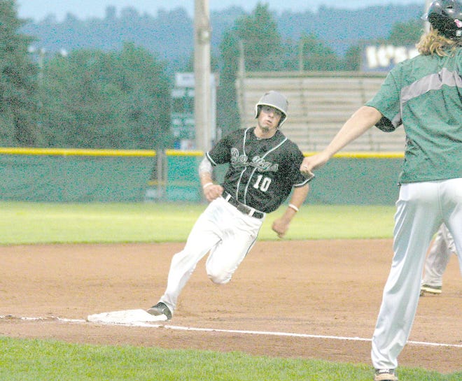 Trey Stover rounds third base on his way home with the third run for the Mohawk Valley DiamondDawgs during the fifth inning of Thursday’s playoff game.



Times Photo/Jon Rathbun