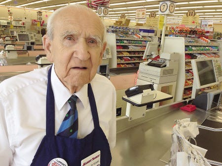 Arthur St. John has worked for 22 years at Market Basket bagging groceries. He celebrated his 94th birthday on Monday.