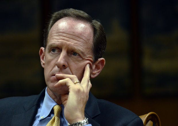 U.S. Sen. Pat Toomey, shown here at a Beaver County Chamber of Commerce event in August 2014, is the target of TV ads from environmental groups unhappy with his opposition to the Obama administration's Clean Power Plan for coal-fired power plants.