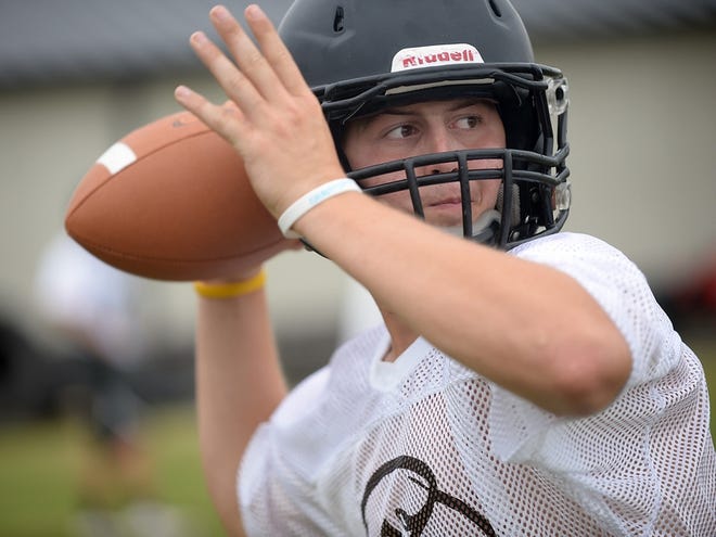 Chesnee quarterback Tristen Thompson prepares to pass during the first day of practice on Friday in Chesnee.