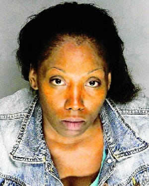 Deonna Wooldridge, mother of the child who fell out of a third-floor window, was arrested on suspicion of child abuse.