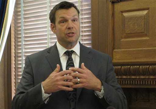 Secretary of State Kris Kobach held off a challenge from Scott Morgan in the GOP primary election Tuesday night.